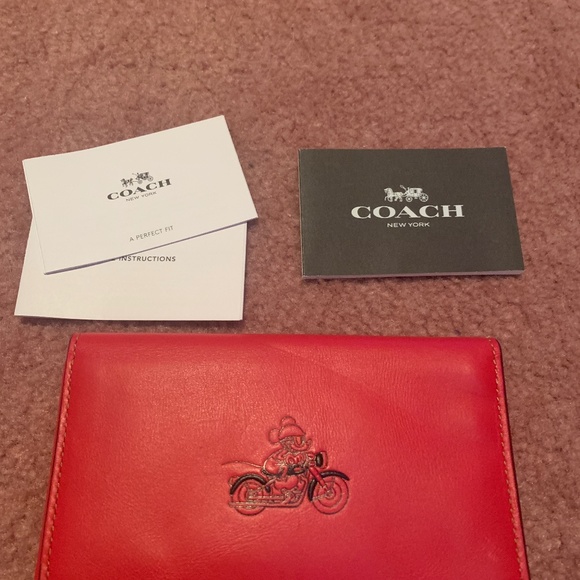 NWT MICKEY COACH Univ phone case leather
